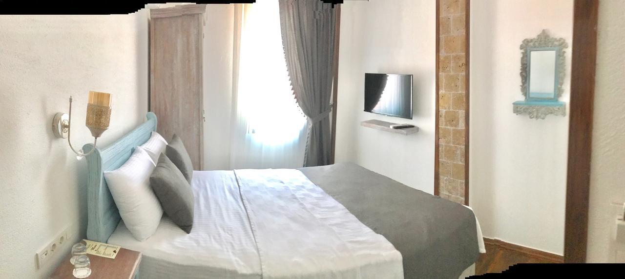 Ayshe Hotel Foça Bagian luar foto